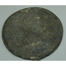 Bronze badge with a hexagon, six-pointed sun symbol